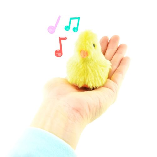 Leksak kyckling som låter när man håller den i handen.